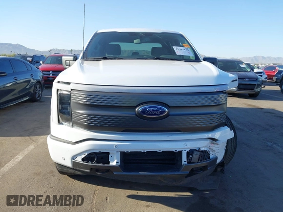 2023 Ford F-150 Lightning Pro with VIN 1FTVW1EL4PWG42578, listed as a IAAI auction lot 41992446 with 26,729 mi miles and . Bid and sale history available at DreamBid. Image 12.