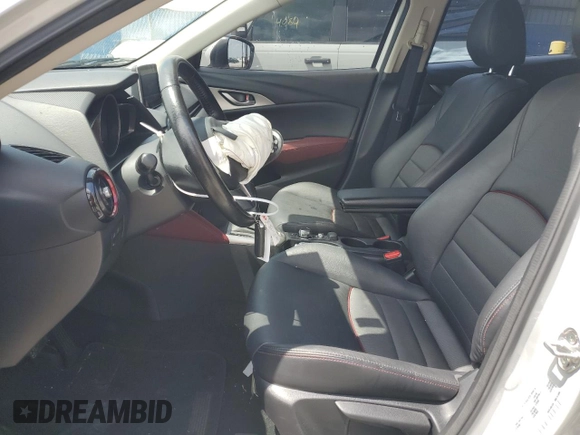2017 Mazda CX-3 Touring z VIN JM1DKDC78H0150588, wystawiony jako Copart lot #55284205 z przebiegiem 78 923 mil mil oraz Szkoda całkowita • Salvage title. Historia ofert i sprzedaży dostępna na DreamBid. Obrazek 7.