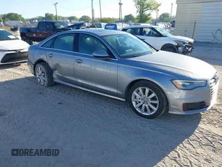 2016 Audi A6 Premium z VIN WAUCFAFC7GN060158, wystawiony jako IAAI lot #41837572 z przebiegiem 60 749 mil mil oraz . Historia ofert i sprzedaży dostępna na DreamBid. Obrazek 1.