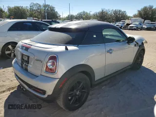 2014 MINI Coupe S z VIN WMWSX3C57ET409158, wystawiony jako Copart lot #81650034 z przebiegiem 118 523 mil mil oraz Szkody całkowita. Historia ofert i sprzedaży dostępna na DreamBid. Obrazek 3.