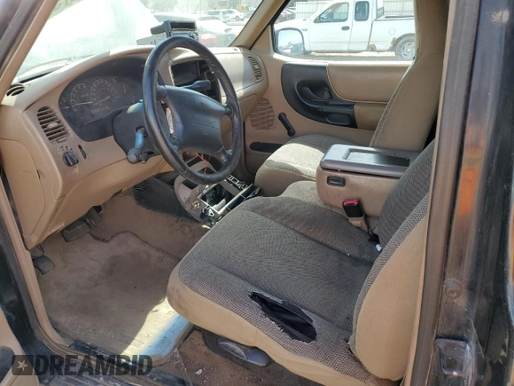2000 Ford Ranger XL with VIN 1FTZR15V9YPA61700, listed as a Copart auction lot 49213275 with 189,054 mi miles and Salvage Title. Bid and sale history available at DreamBid. Image 7.