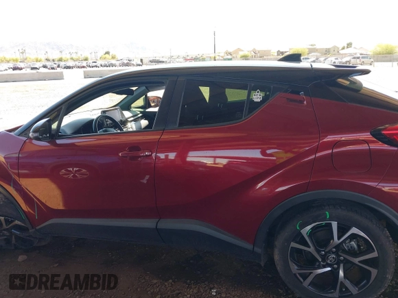 2019 Toyota C-HR XLE with VIN JTNKHMBX8K1032206, listed as a IAAI auction lot 41852134 with 136,107 mi miles. Bid and sale history available at carsss.com. Image 14.