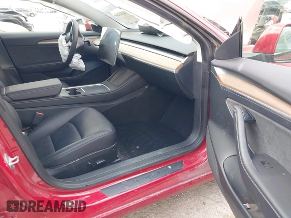 2023 Tesla Model 3 z VIN 5YJ3E1EA1PF509094, wystawiony jako IAAI lot #41843497 z przebiegiem 37 677 mil mil oraz . Historia ofert i sprzedaży dostępna na DreamBid. Obrazek 5.