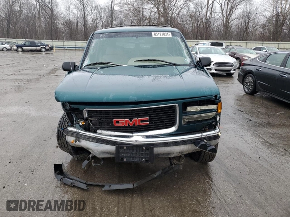 1995 GMC Suburban z VIN 1GKFK16K0SJ748087, wystawiony jako Copart lot #85121834 z przebiegiem 191 550 mil mil oraz Szkoda całkowita • Salvage title. Historia ofert i sprzedaży dostępna na DreamBid. Obrazek 5.