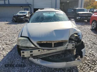 2004 Mercury Sable z VIN 1MEFM58UX4A612059, wystawiony jako Copart lot #77181894 z przebiegiem Nie podano mil oraz Czysty tytuł • Clean title. Historia ofert i sprzedaży dostępna na DreamBid. Obrazek 5.