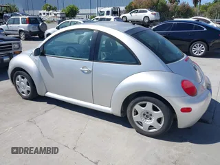 2001 Volkswagen Beetle GLS with VIN 3VWCD21C11M412672, listed as a IAAI auction lot 42336934 with 145,667 mi miles and . Bid and sale history available at DreamBid. Image 3.