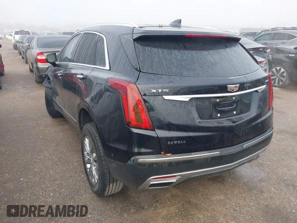 2021 Cadillac XT5 FWD Premium Luxury with VIN 1GYKNCRS2MZ185678, listed as a IAAI auction lot 41143084 with 25,399 mi miles and . Bid and sale history available at carsss.com. Image 3.