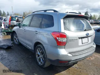 2015 Subaru Forester 2.5i Touring with VIN JF2SJAWC7FH426132, listed as a IAAI auction lot 41937213 with 125,137 mi miles. Bid and sale history available at carsss.com. Image 3.