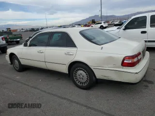 1998 Infiniti Q45 z VIN JNKBY31A8WM403038, wystawiony jako Copart lot #86904484 z przebiegiem 136 142 mil mil oraz Szkoda całkowita • Salvage title. Historia ofert i sprzedaży dostępna na DreamBid. Obrazek 2.