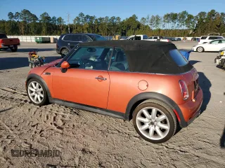 2007 MINI Convertible S with VIN WMWRH33587TJ43499, listed as a Copart auction lot 76266684 with 103,691 mi miles and Salvage title. Bid and sale history available at DreamBid. Image 2.