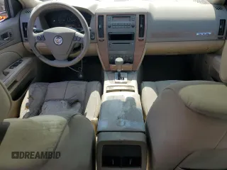 2006 Cadillac STS z VIN 1G6DW677560132284, wystawiony jako Copart lot #55707415 z przebiegiem 329 037 mil mil oraz Czysty tytuł • Clean title. Historia ofert i sprzedaży dostępna na DreamBid. Obrazek 8.