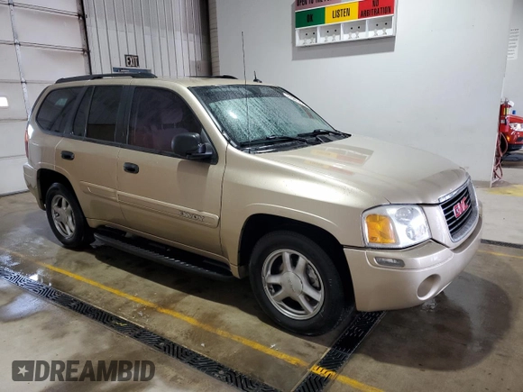 2005 GMC Envoy SLE with VIN 1GKDT13S352108513, listed as a Copart auction lot 51581475 with 160,610 mi miles and Salvage Title. Bid and sale history available at carsss.com. Image 4.