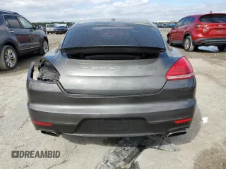 2016 Porsche Panamera 4 z VIN WP0AA2A77GL002362, wystawiony jako Copart lot #46124245 z przebiegiem 71 303 mil mil oraz Szkody całkowita. Historia ofert i sprzedaży dostępna na DreamBid. Obrazek 6.