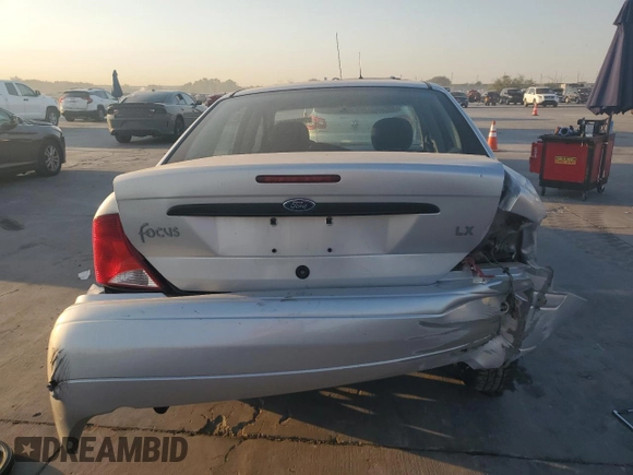 2000 Ford Focus LX with VIN 1FAFP33P6YW376765, listed as a Copart auction lot 75347554 with 189,468 mi miles and Salvage Title. Bid and sale history available at DreamBid. Image 6.