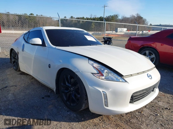 2015 Nissan 370Z Sport with VIN JN1AZ4EH0FM440627, listed as a IAAI auction lot 41410844 with 99,420 mi miles. Bid and sale history available at carsss.com. Image 1.