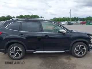 2023 Subaru Forester Touring with VIN JF2SKARC4PH485522, listed as a IAAI auction lot 42544425 with 38,872 mi miles and . Bid and sale history available at DreamBid. Image 14.