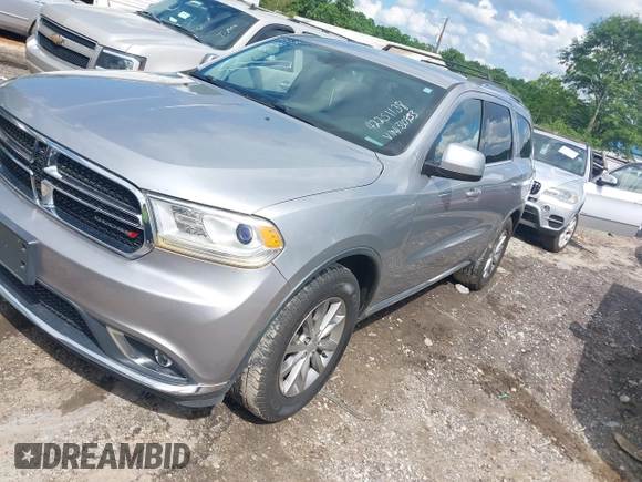 2016 Dodge Durango SXT with VIN 1C4RDHAG8GC330953, listed as a IAAI auction lot 42251138 with 118,604 mi miles and . Bid and sale history available at DreamBid. Image 2.