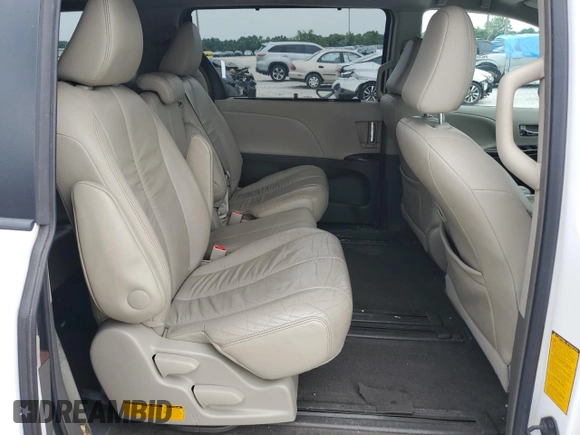 2012 Toyota Sienna XLE AAS с VIN 5TDYK3DC7CS207716, выставлен на аукционе Copart как лот 60592265 с пробегом 287 021 миль миль и Списание • Salvage title. История ставок и продаж доступна на DreamBid. Изображение 11.