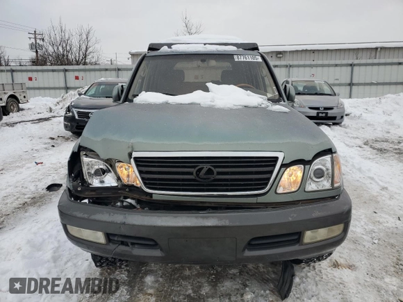 2002 Lexus LX 470 z VIN JTJHT00W923514121, wystawiony jako Copart lot #87761105 z przebiegiem 247 752 mil mil oraz Szkody całkowita. Historia ofert i sprzedaży dostępna na DreamBid. Obrazek 5.