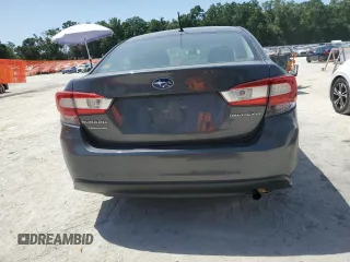 2021 Subaru Impreza с VIN 4S3GKAB67M3602270, выставлен на аукционе Copart как лот 57034895 с пробегом 55 783 миль миль и Списание • Salvage title. История ставок и продаж доступна на DreamBid. Изображение 6.