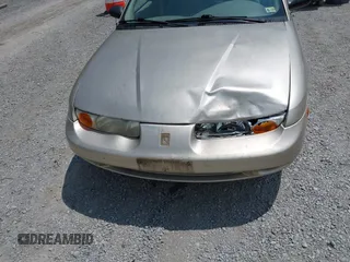2001 Saturn SL z VIN 1G8ZK54721Z272773, wystawiony jako IAAI lot #42449133 z przebiegiem 56 714 mil mil oraz . Historia ofert i sprzedaży dostępna na DreamBid. Obrazek 6.