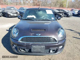 2013 MINI Cooper Convertible S with VIN WMWZP3C56DT705074, listed as a IAAI auction lot 40762024 with 57,685 mi miles. Bid and sale history available at carsss.com. Image 12.