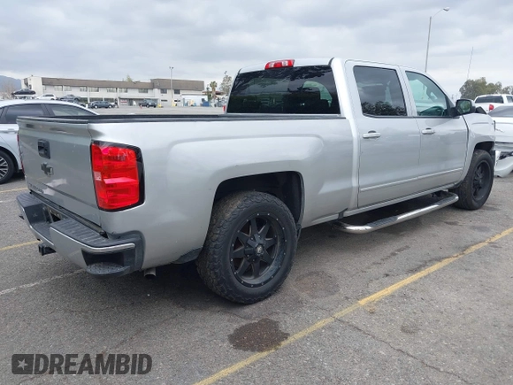 2017 Chevrolet Silverado 1500 LT with VIN 1GCPCREC9HF134351, listed as a IAAI auction lot 41910972 with 185,359 mi miles and . Bid and sale history available at DreamBid. Image 4.