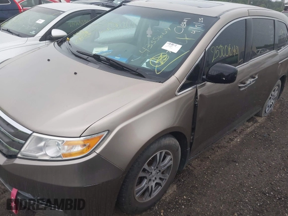 2011 Honda Odyssey EX-L with VIN 5FNRL5H68BB054204, listed as a IAAI auction lot 42576248 with Not provided miles and . Bid and sale history available at DreamBid. Image 6.