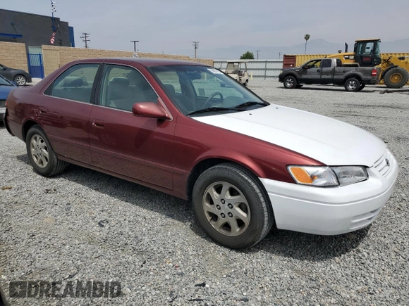 1999 Toyota Camry LE z VIN JT2BF22K8X0181675, wystawiony jako Copart lot #55057875 z przebiegiem 184 657 mil mil oraz Szkoda całkowita • Salvage title. Historia ofert i sprzedaży dostępna na DreamBid. Obrazek 4.