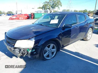 2014 Dodge Avenger SE with VIN 1C3CDZAG9EN223122, listed as a IAAI auction lot 40882250 with 139,552 mi miles. Bid and sale history available at carsss.com. Image 2.