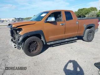2016 Toyota Tundra SR z VIN 5TFRM5F19GX102715, wystawiony jako IAAI lot #41265300 z przebiegiem 109 619 mil mil oraz . Historia ofert i sprzedaży dostępna na DreamBid. Obrazek 18.