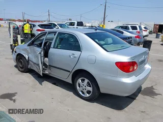 2007 Toyota Corolla CE with VIN JTDBR32E570108648, listed as a IAAI auction lot 42509739 with 61,309 mi miles and . Bid and sale history available at DreamBid. Image 3.