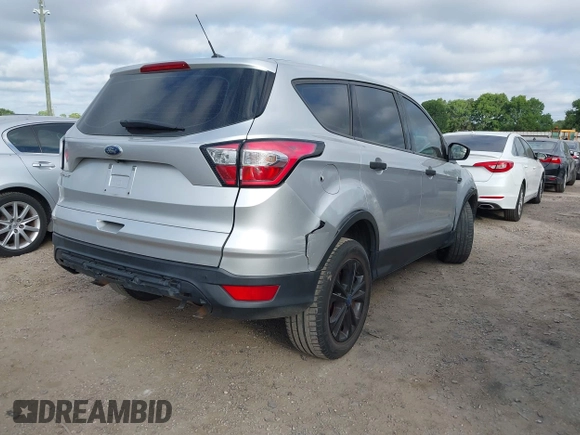2018 Ford Escape S with VIN 1FMCU0F70JUB72329, listed as a IAAI auction lot 42016533 with 132,029 mi miles. Bid and sale history available at carsss.com. Image 4.
