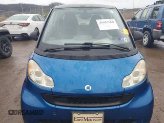 2009 Smart fortwo Pure with VIN WMEEJ31X69K312553, listed as a IAAI auction lot 41957660 with 156,476 mi miles. Bid and sale history available at carsss.com. Image 6.