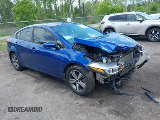 2018 Kia Forte LX with VIN 3KPFL4A77JE281839, listed as a IAAI auction lot 42012006 with 134,675 mi miles and . Bid and sale history available at DreamBid. Image 1.