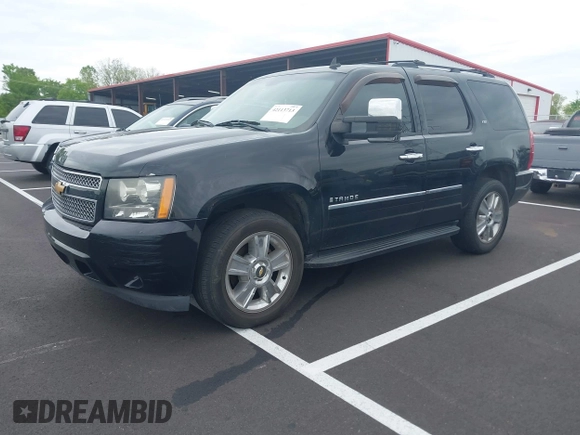 2009 Chevrolet Tahoe LTZ z VIN 1GNFK330X9R130028, wystawiony jako IAAI lot #42113713 z przebiegiem 135 631 mil mil oraz . Historia ofert i sprzedaży dostępna na DreamBid. Obrazek 17.