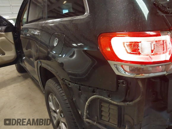2015 Jeep Grand Cherokee Limited with VIN 1C4RJFBGXFC205124, listed as a IAAI auction lot 41405059 with 194,124 mi miles. Bid and sale history available at carsss.com. Image 18.