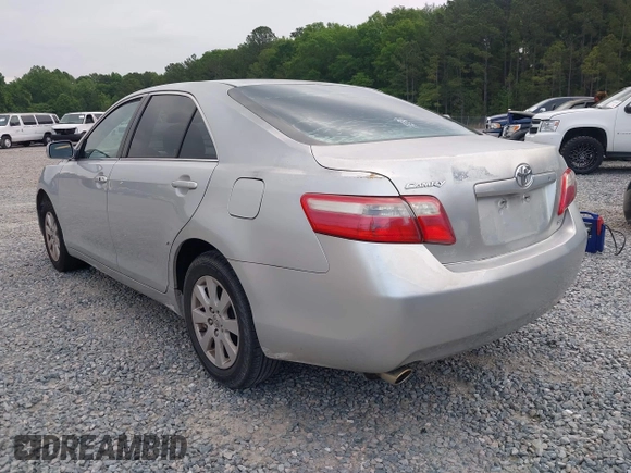 2007 Toyota Camry LE with VIN 4T1BK46KX7U530347, listed as a IAAI auction lot 42143487 with 254,337 mi miles and . Bid and sale history available at DreamBid. Image 3.