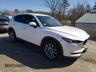 2021 Mazda CX-5 Grand Touring with VIN JM3KFBDM9M1426809, listed as a Copart auction lot 48468345 with 74,500 mi miles and Salvage Title. Bid and sale history available at carsss.com. Image 4.
