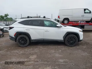 2023 Hyundai Tucson SEL with VIN 5NMJFCAE0PH197194, listed as a IAAI auction lot 42241030 with 17,764 mi miles and . Bid and sale history available at DreamBid. Image 13.