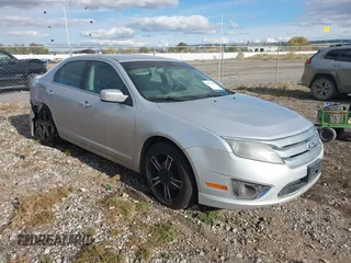 2011 Ford Fusion SEL with VIN 3FAHP0CG5BR335674, listed as a IAAI auction lot 40636468 with 141,869 mi miles. Bid and sale history available at carsss.com. Image 1.