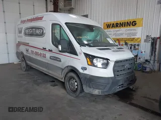 2020 Ford Transit Cargo z VIN 1FTBR1CG9LKB59461, wystawiony jako IAAI lot #41807469 z przebiegiem 205 431 mil mil oraz . Historia ofert i sprzedaży dostępna na DreamBid. Obrazek 1.
