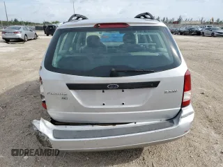 2005 Ford Focus SE with VIN 1FAFP36N75W299099, listed as a Copart auction lot 51410635 with 160,652 mi miles and Salvage Title. Bid and sale history available at carsss.com. Image 6.