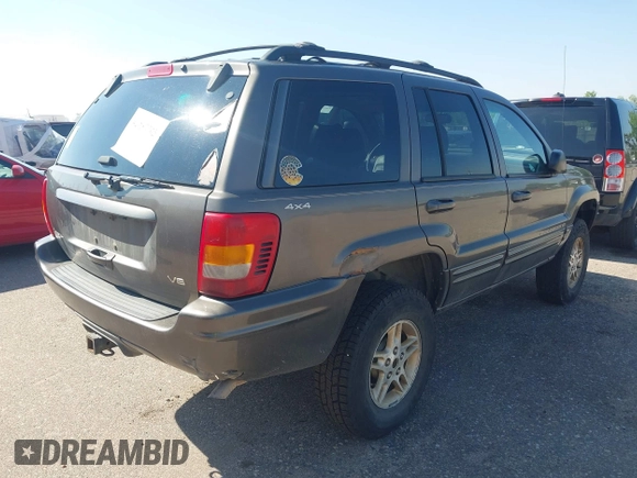 1999 Jeep Grand Cherokee Limited with VIN 1J4GW68N7XC617687, listed as a IAAI auction lot 42433705 with 186,312 mi miles and . Bid and sale history available at DreamBid. Image 4.