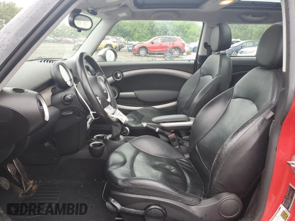 2007 MINI Hardtop S with VIN WMWMF73507TL86439, listed as a Copart auction lot 56500525 with 153,944 mi miles and Salvage title. Bid and sale history available at DreamBid. Image 7.