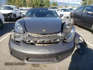 2017 Porsche 718 Boxster z VIN WP0CA2A81HS221942, wystawiony jako Copart lot #36581523 z przebiegiem 73 954 mil mil oraz . Historia ofert i sprzedaży dostępna na DreamBid. Obrazek 5.