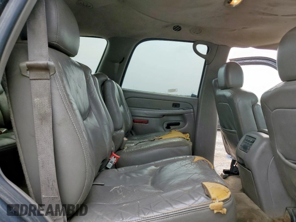 2004 Chevrolet Tahoe LT z VIN 1GNEC13Z84J171857, wystawiony jako Copart lot #57993315 z przebiegiem 239 893 mil mil oraz Szkoda całkowita • Salvage title. Historia ofert i sprzedaży dostępna na DreamBid. Obrazek 11.