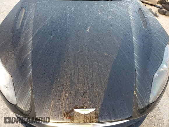 2019 Aston Martin DB11 z VIN SCFRMFCW9KGM05896, wystawiony jako Copart lot #78158154 z przebiegiem Nie podano mil oraz Nie do naprawy. Historia ofert i sprzedaży dostępna na DreamBid. Obrazek 12.