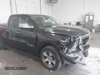 2020 Ram 1500 Laramie with VIN 1C6SRFDT7LN142009, listed as a IAAI auction lot 42330341 with 108,351 mi miles and . Bid and sale history available at DreamBid. Image 6.