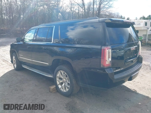 2015 GMC Yukon XL SLT with VIN 1GKS2HKC9FR159164, listed as a IAAI auction lot 41235420 with 136,730 mi miles. Bid and sale history available at carsss.com. Image 3.